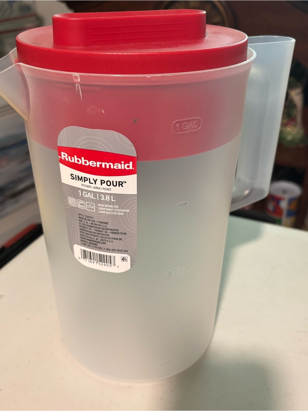 Rubbermaid Simply Pour Pitcher with Red Lid and Frosted body. Plastic